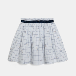 تنورة قصيرة بمربعات باللون الأبيض للبنات